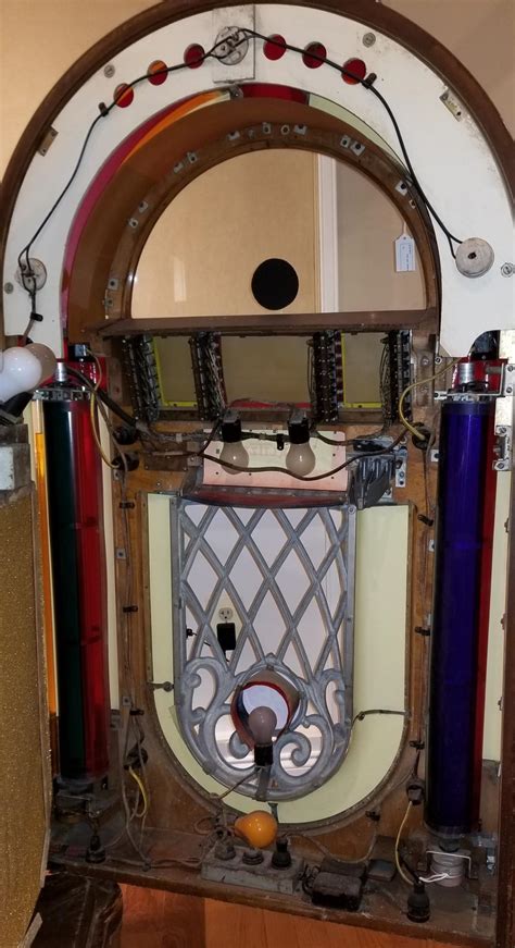 We are moving our Wurlitzer 1015 "one More Time" jukebox long distance and need to secure the moving parts. . Wurlitzer jukebox 1015 troubleshooting